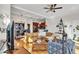Spacious living area with a kitchen and bar, perfect for entertaining, with hardwood floors and stylish furnishings at 1258 Dekalb Ne Ave # 129, Atlanta, GA 30307