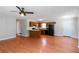 Open kitchen with a breakfast bar and black appliances adjacent to the living area at 37 Indian Hills Ct, Dallas, GA 30157