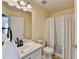Bathroom featuring a single vanity and shower/tub combo at 4184 Wyndham Park Way, Buford, GA 30519