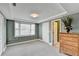 Spacious bedroom with large window, closet, and view of ensuite bathroom at 4184 Wyndham Park Way, Buford, GA 30519