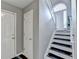Entryway featuring stairs with carpet runners at 4184 Wyndham Park Way, Buford, GA 30519
