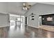 Bright living room with hardwood floors, fireplace, and an open layout at 4184 Wyndham Park Way, Buford, GA 30519