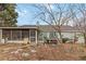 Spacious backyard with screened porch, perfect for outdoor relaxation and entertainment at 1220 Tab Roberts Rd, Lawrenceville, GA 30043