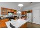 Bright kitchen with modern appliances and a breakfast bar at 1220 Tab Roberts Rd, Lawrenceville, GA 30043