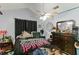 Stylish main bedroom with a ceiling fan and plenty of storage space at 1220 Tab Roberts Rd, Lawrenceville, GA 30043