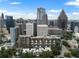 Stunning aerial view of condominium building amidst the vibrant Atlanta skyline, a luxurious city living experience at 145 15Th Ne St # 843, Atlanta, GA 30309