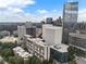Stunning aerial view of the city skyline, showcasing modern high-rise buildings and lush green spaces at 145 15Th Ne St # 843, Atlanta, GA 30309