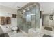 Modern bathroom boasts an oversized glass shower with multiple shower heads at 145 15Th Ne St # 843, Atlanta, GA 30309