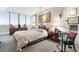 Bedroom with large window view, neutral tones, and recessed lighting at 145 15Th Ne St # 843, Atlanta, GA 30309