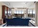 Spacious living room filled with natural light, complemented by refined furnishings and a balcony view at 145 15Th Ne St # 843, Atlanta, GA 30309
