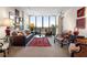 Bright living room with floor-to-ceiling windows, offering great views and natural light at 145 15Th Ne St # 843, Atlanta, GA 30309