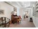 Office features carpeted floors, a desk with chairs, and built-in shelves at 145 15Th Ne St # 843, Atlanta, GA 30309