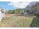 View of the spacious backyard with a storage shed and lush greenery at 1925 Meyers Dr, Lawrenceville, GA 30045