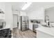 Bright kitchen features stainless steel appliances, gas range, and quartz countertops at 1925 Meyers Dr, Lawrenceville, GA 30045