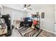Well-lit home office setup with a desk, chair, computer, and stylish decor at 1925 Meyers Dr, Lawrenceville, GA 30045
