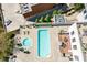An aerial view captures a meticulously maintained pool, hot tub, and patio area offering a private retreat at 2277 Peachtree Ne Rd # 608, Atlanta, GA 30309