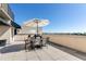 Condo balcony with dining area and patio umbrella, perfect for outdoor entertaining at 2277 Peachtree Ne Rd # 608, Atlanta, GA 30309