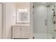 Elegant bathroom with a glass shower and a white vanity at 2277 Peachtree Ne Rd # 608, Atlanta, GA 30309