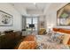 Cozy bedroom with large bed, wood floors, and bright, sunny window at 2277 Peachtree Ne Rd # 608, Atlanta, GA 30309