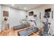 Well-equipped gym featuring treadmills, elliptical machine, and mounted TVs for entertainment at 2277 Peachtree Ne Rd # 608, Atlanta, GA 30309
