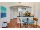 Cozy eat-in kitchen featuring white cabinets and stainless steel appliances at 2277 Peachtree Ne Rd # 608, Atlanta, GA 30309