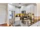 Well-lit kitchen with modern appliances, granite counters, and stylish cabinets at 2277 Peachtree Ne Rd # 608, Atlanta, GA 30309