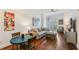 Cozy living room open to kitchen and featuring hardwood floors and modern decor at 2277 Peachtree Ne Rd # 608, Atlanta, GA 30309