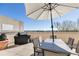 Inviting rooftop patio featuring an outdoor dining set, grill, and beautiful views of the surrounding landscape at 2277 Peachtree Ne Rd # 608, Atlanta, GA 30309