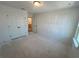 Bedroom with double door closet leading to ensuite bath at 630 Gilles Ln, Cumming, GA 30041