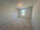 Bright bedroom with a light and window, perfect for relaxing at 630 Gilles Ln, Cumming, GA 30041