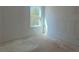 Bright bedroom with a window letting in natural light at 630 Gilles Ln, Cumming, GA 30041
