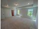 Large bedroom features recessed lighting, tray ceiling and large windows at 630 Gilles Ln, Cumming, GA 30041