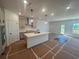 Modern kitchen with a large island, stainless steel appliances, and ample counter space at 630 Gilles Ln, Cumming, GA 30041