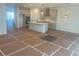 Open concept kitchen with a center island, pendant lighting, and modern stainless steel appliances at 630 Gilles Ln, Cumming, GA 30041