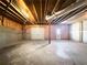 Unfinished basement with garage door for easy access at 9585 Grande Dr, Winston, GA 30187