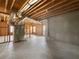 Unfinished basement with duct work, windows, and space for storage at 9585 Grande Dr, Winston, GA 30187