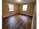 Bedroom with two windows and hardwood floors at 2061 Detroit Nw Ave, Atlanta, GA 30314