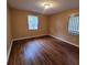 Bedroom with two windows and hardwood floors at 2061 Detroit Nw Ave, Atlanta, GA 30314