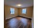 Bedroom with two windows and hardwood floors at 2061 Detroit Nw Ave, Atlanta, GA 30314