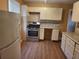 Bright kitchen with white cabinets, stainless steel gas range, and updated countertops at 2061 Detroit Nw Ave, Atlanta, GA 30314