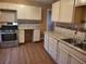 Updated kitchen featuring white cabinets, stainless steel appliances, and modern countertops at 2061 Detroit Nw Ave, Atlanta, GA 30314