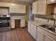Well-equipped kitchen with modern appliances, granite countertops, and ample cabinet space at 2061 Detroit Nw Ave, Atlanta, GA 30314