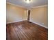 Spacious living room featuring hardwood floors, neutral paint, and a bright, open layout at 2061 Detroit Nw Ave, Atlanta, GA 30314