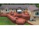 Aerial view of a wooden patio surrounded by lush greenery and an intricate patio system at 12040 Old Mountain Park Rd, Roswell, GA 30075