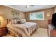Comfortable bedroom with large bed, wood dresser, and window at 12040 Old Mountain Park Rd, Roswell, GA 30075