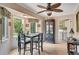 Bright breakfast nook with tile flooring and a view of the exterior landscape at 12040 Old Mountain Park Rd, Roswell, GA 30075