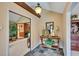 Welcoming foyer with slate tile flooring, complemented by a console table and elegant decor at 12040 Old Mountain Park Rd, Roswell, GA 30075