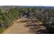 Expansive acreage showcasing a beautiful home, mature trees, and ample space at 1325 Whitlock Sw Ave, Marietta, GA 30064