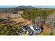 Sprawling property featuring a home with a large yard, trees, pond, and mountain views at 1325 Whitlock Sw Ave, Marietta, GA 30064