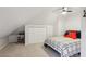 Cozy bedroom featuring neutral carpet, ceiling fan, and double-door closet at 1325 Whitlock Sw Ave, Marietta, GA 30064
